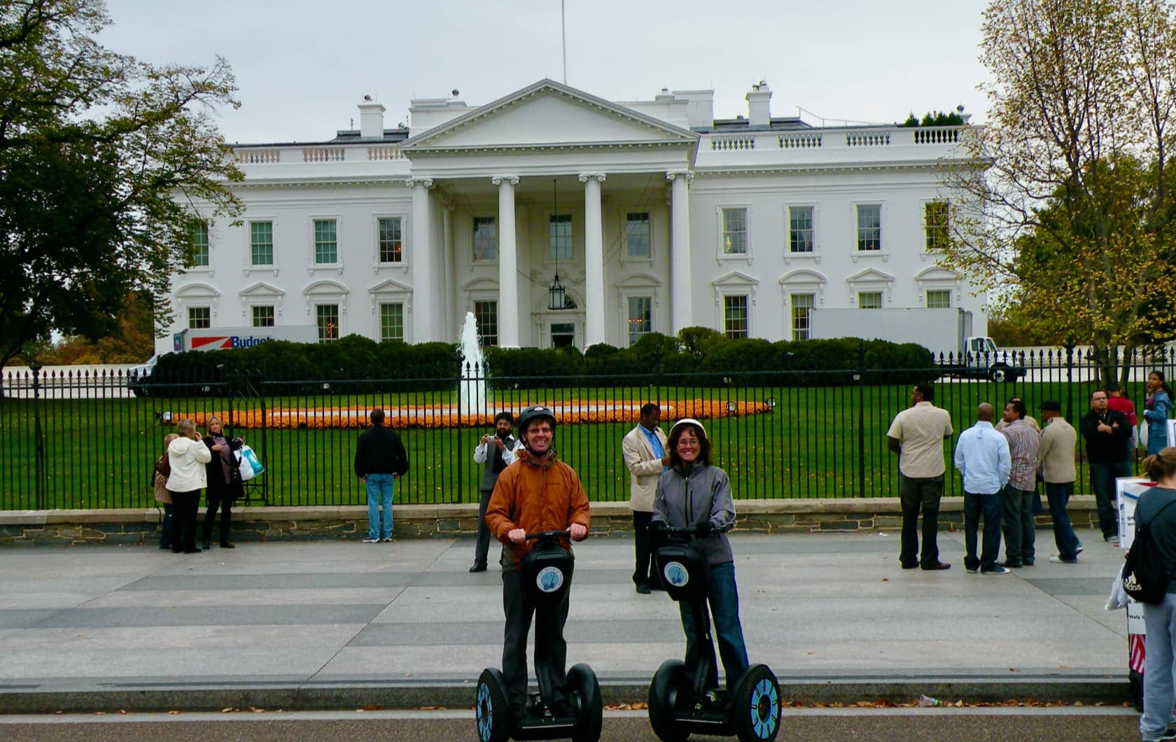 Man and woman on segways in front of US White House