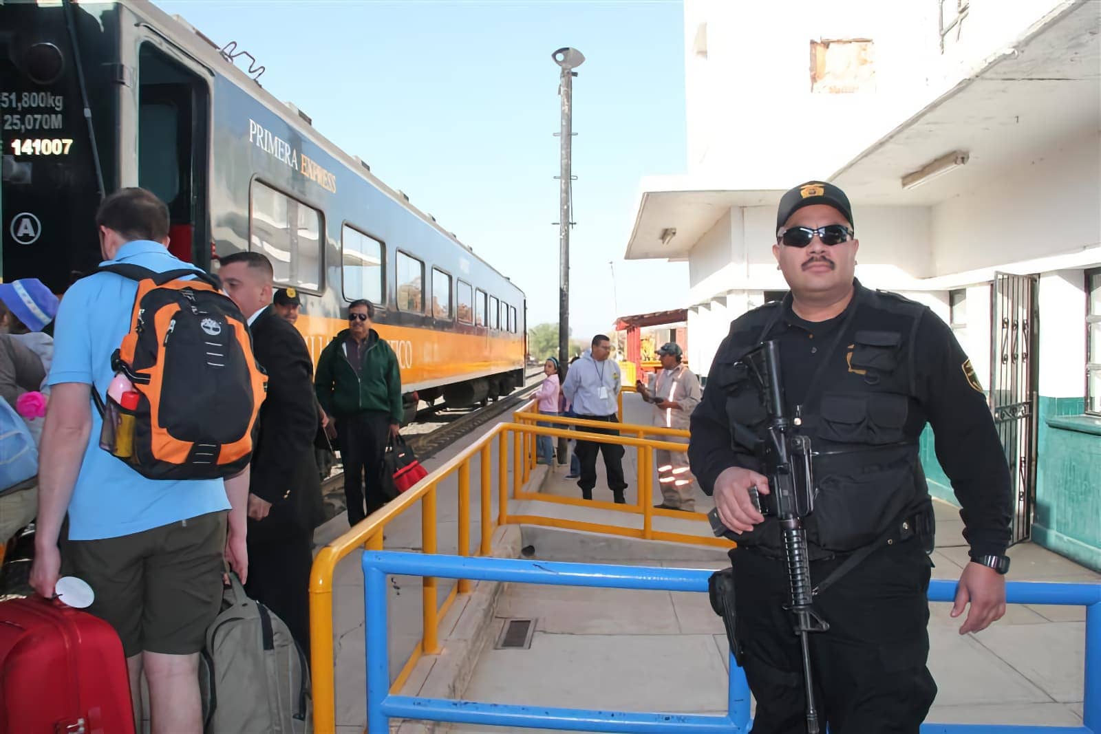 Train station with armed security guard in Mexico