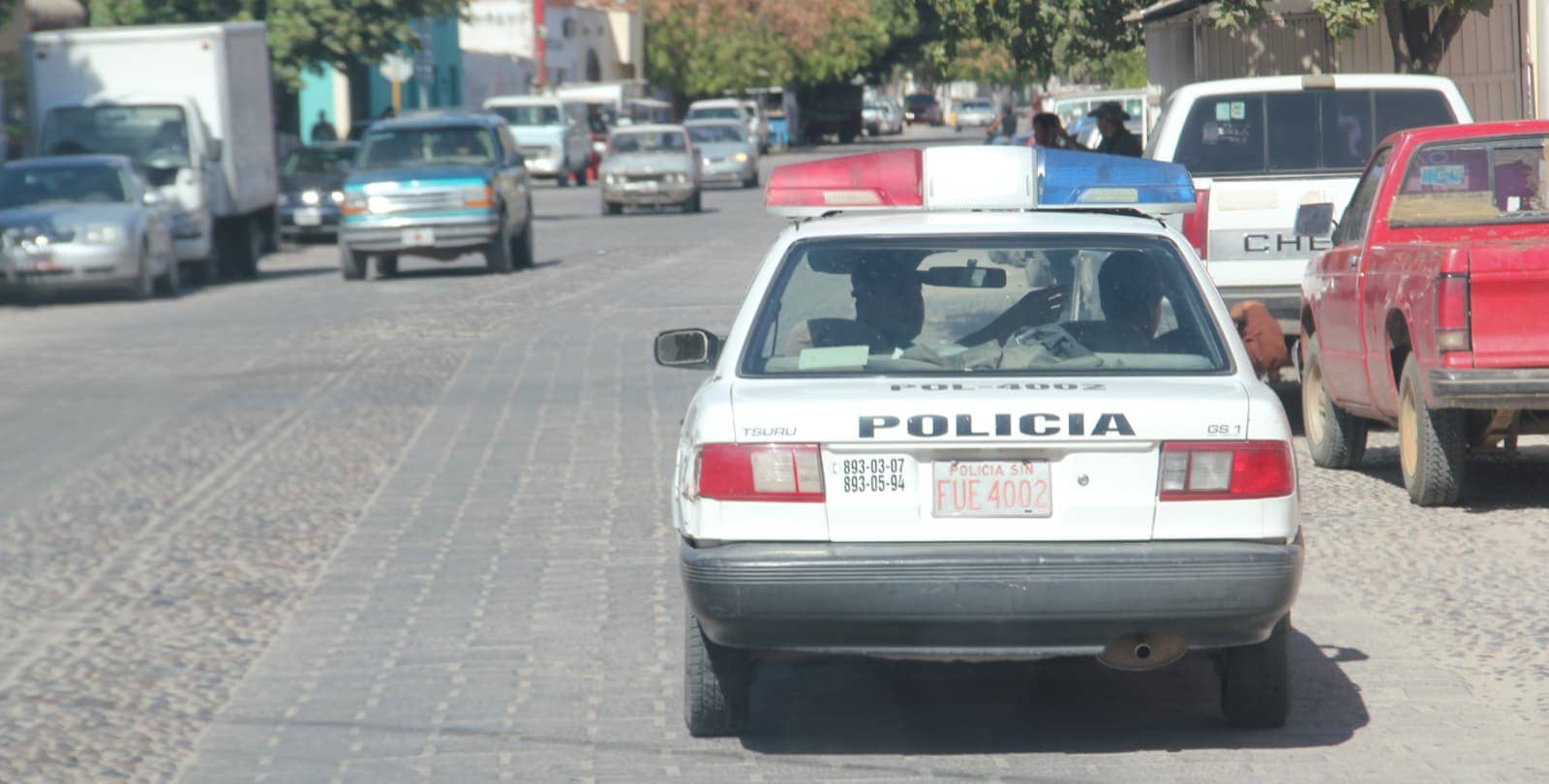 Police car driving in Mexico