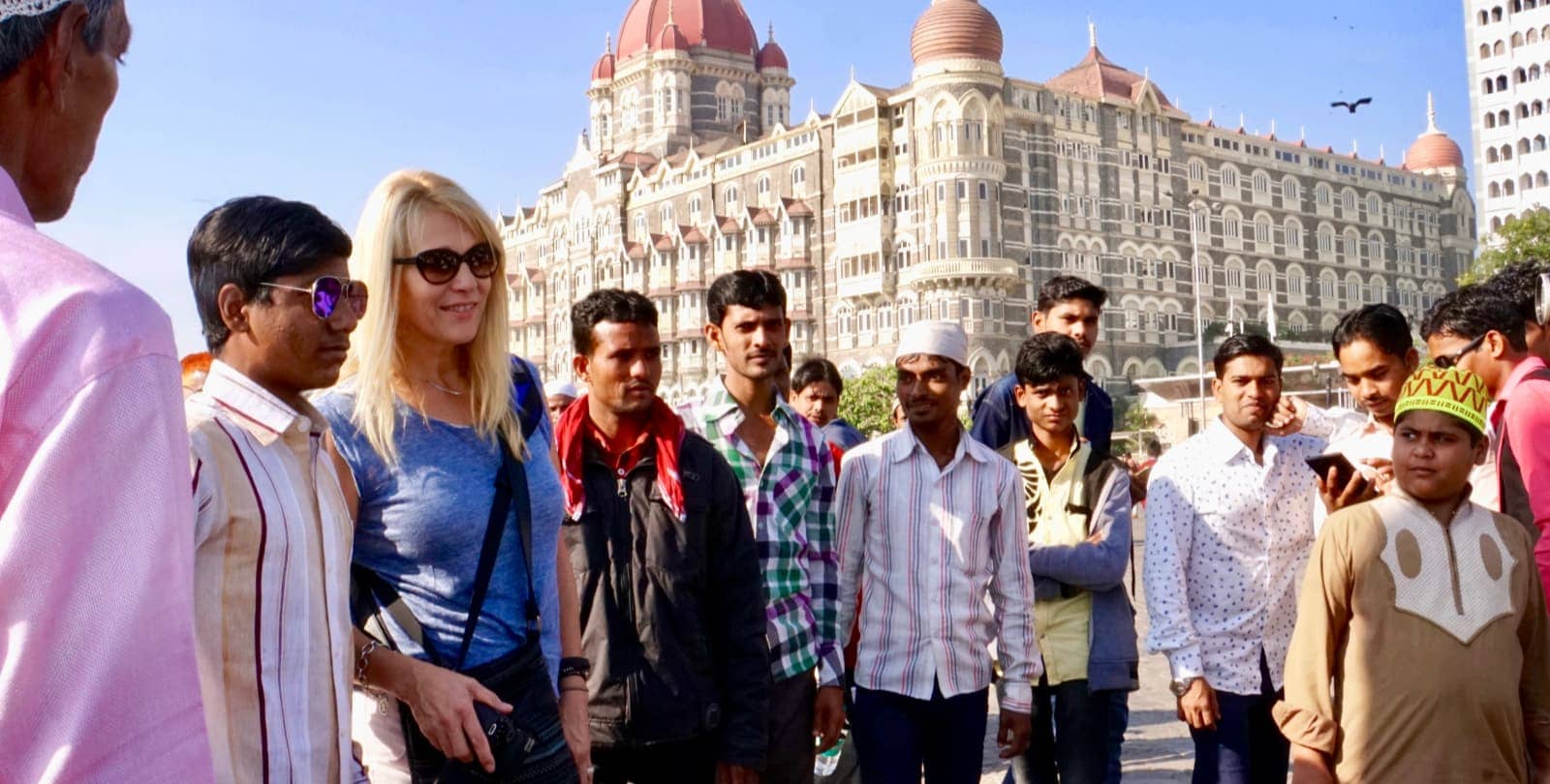 Men and a woman on the streets of Mumbai