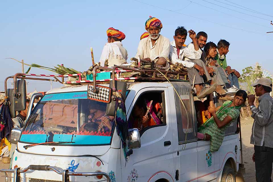 People riding in truck