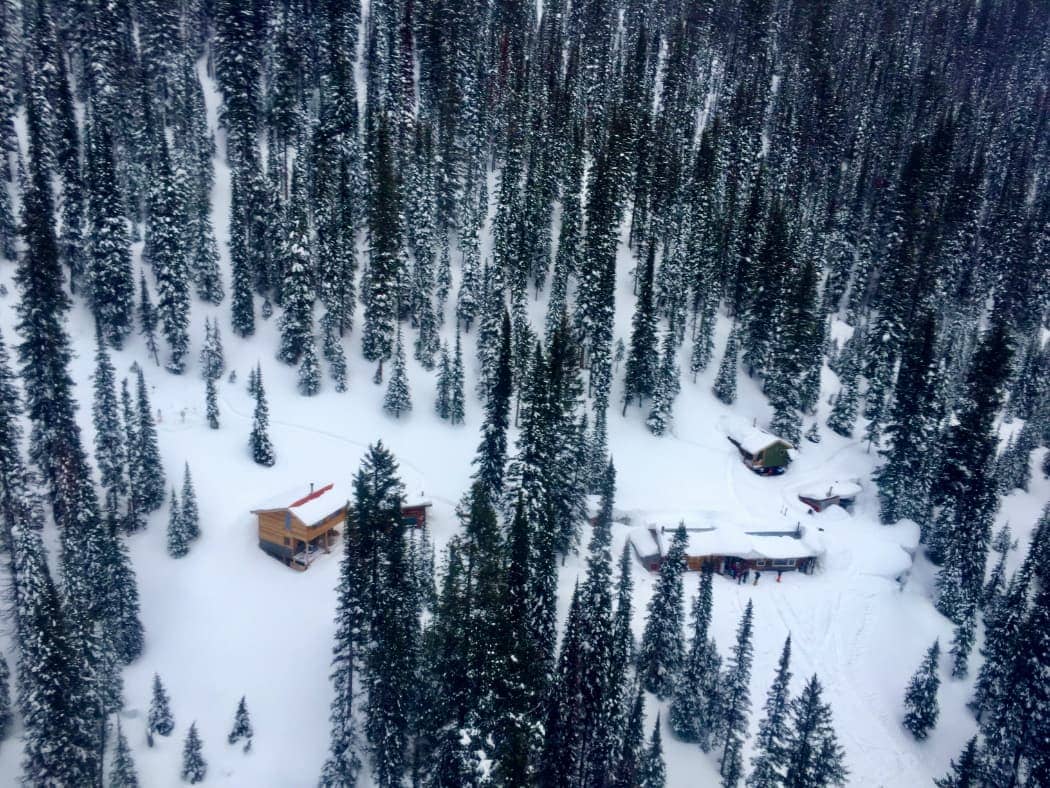 Aerial view of huts covered with snow