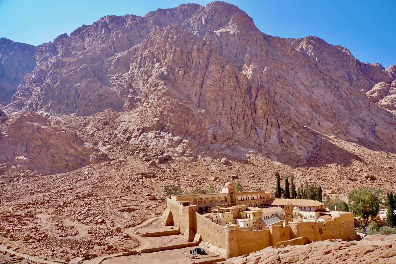 Ancient architecure with towering mountains