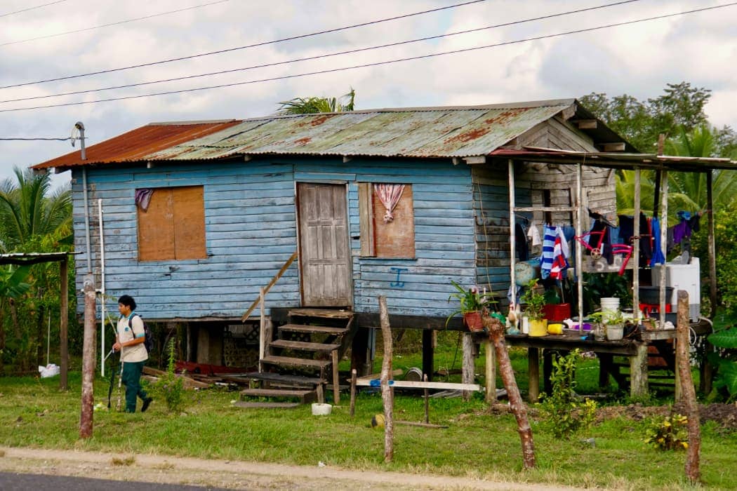 Blue painted house on stilts