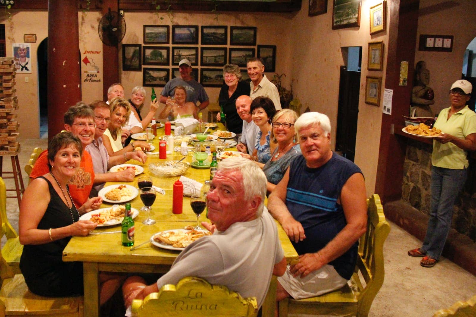 Group of people enjoying meal in restaurant