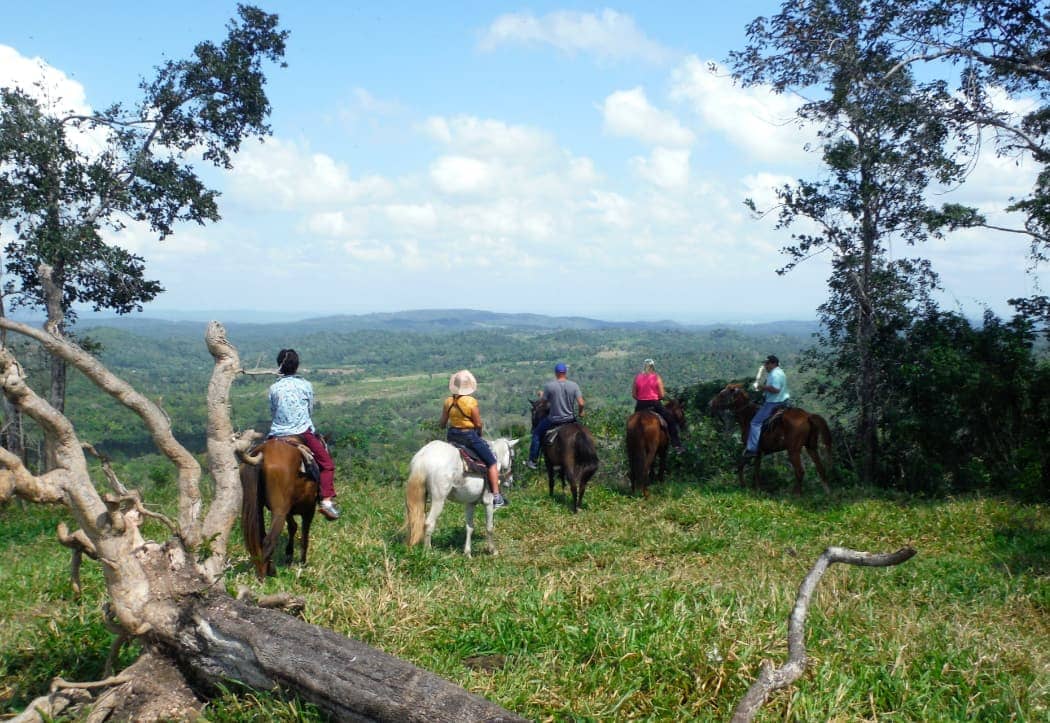 Group of people horse back riding