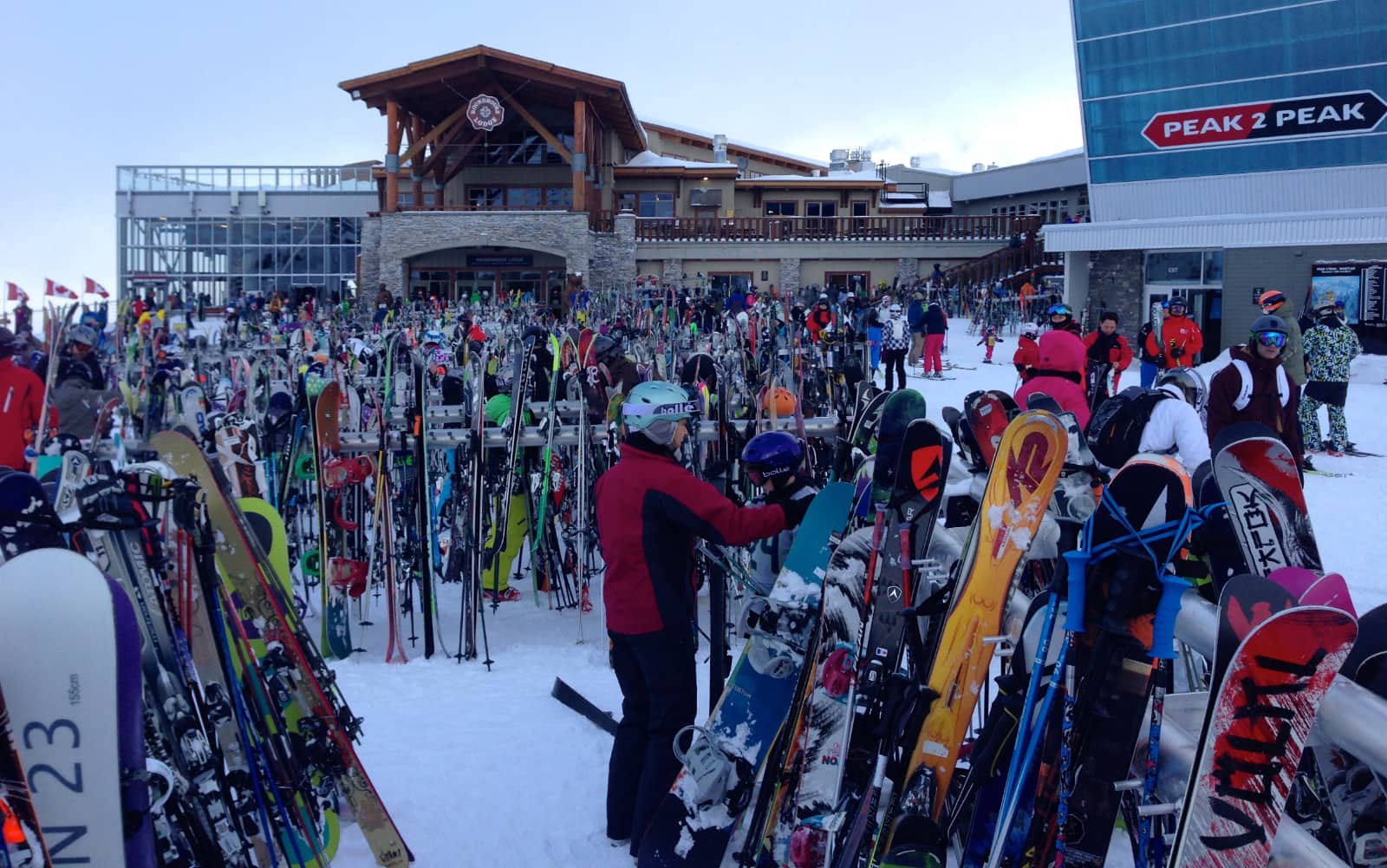 Large group of people and ski equipment