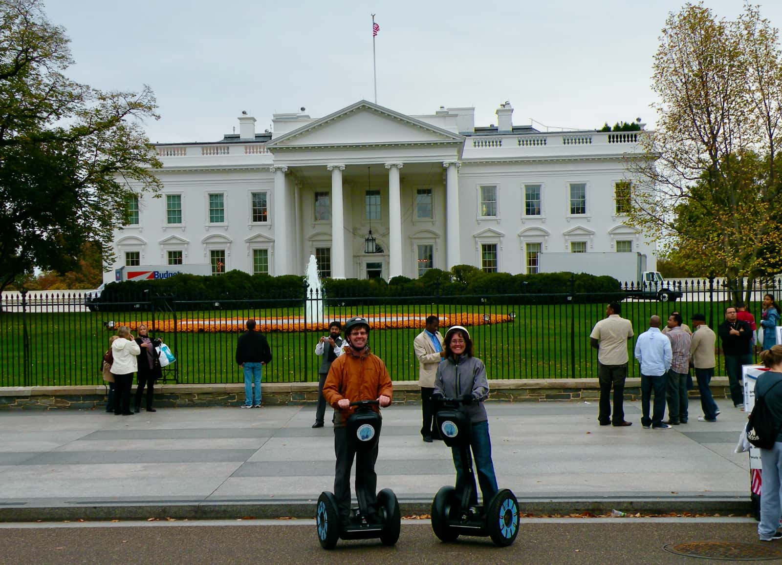 Man and woman riding segways in front of US White House