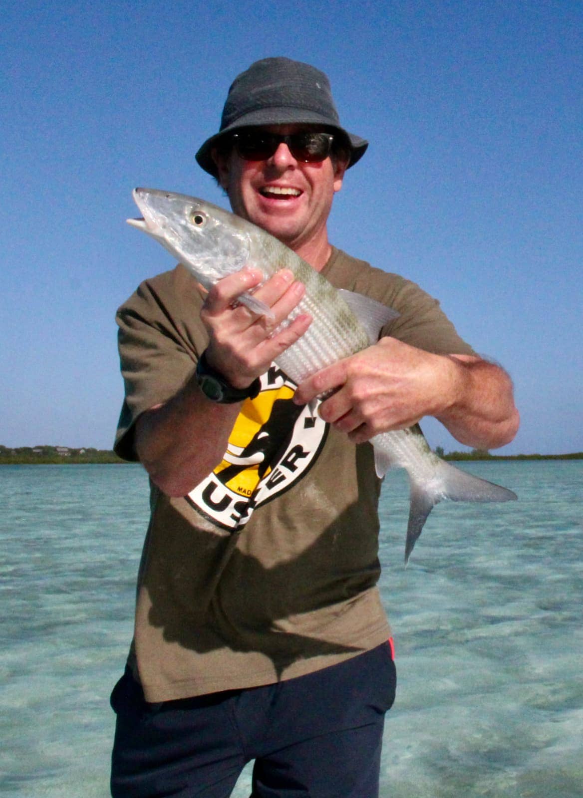 Man standing with fish in hands