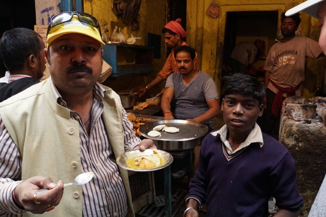 Men enjoying local food