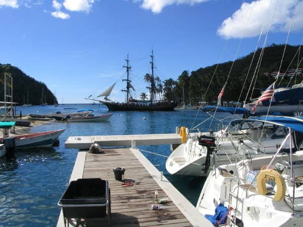 Multiple boats moored in harbour