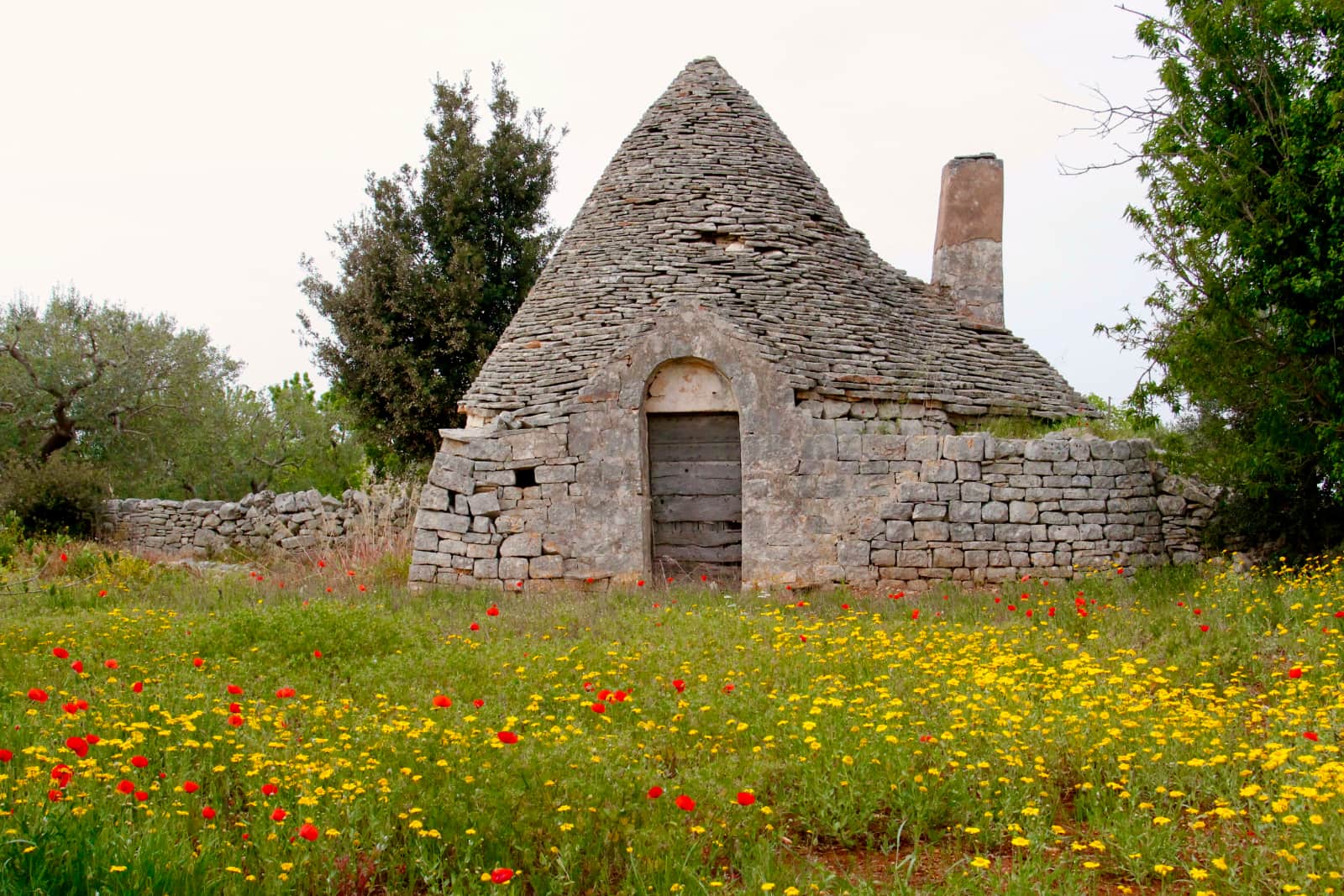 Old stone building in field