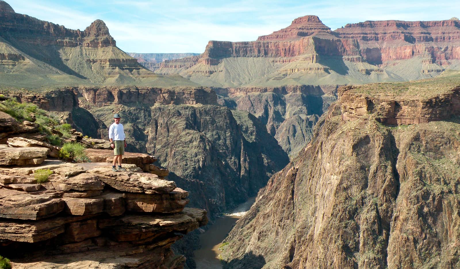 Person standing on edge of canyon