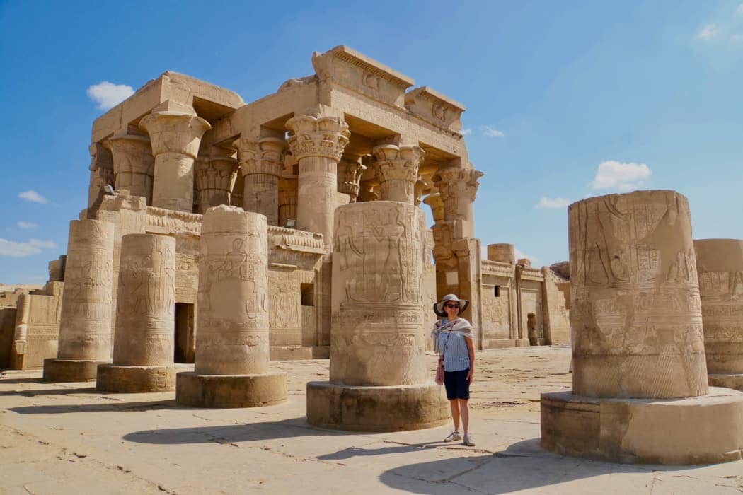 Woman posing outside ruins near the Nile in Egypt