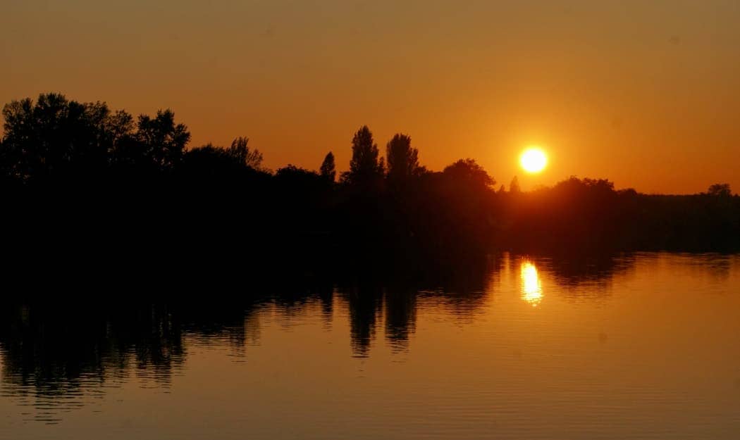 Sunset over waterway