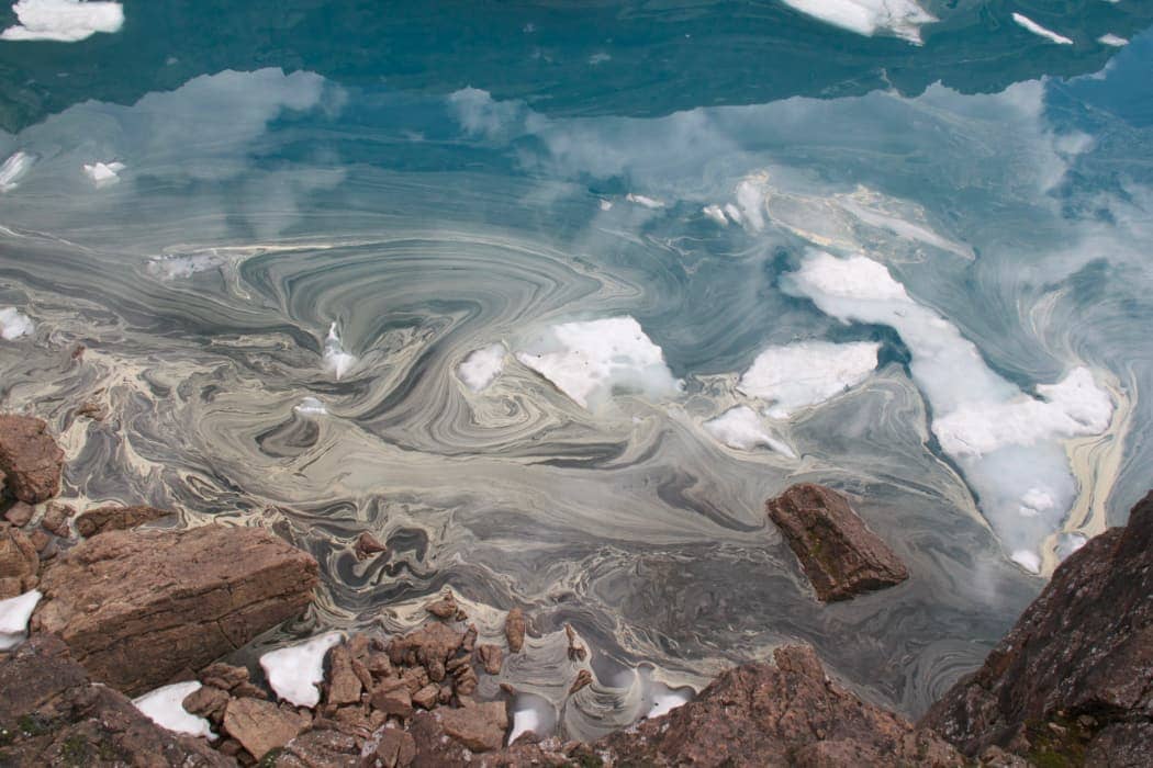 Swirling mix of grey and blue water