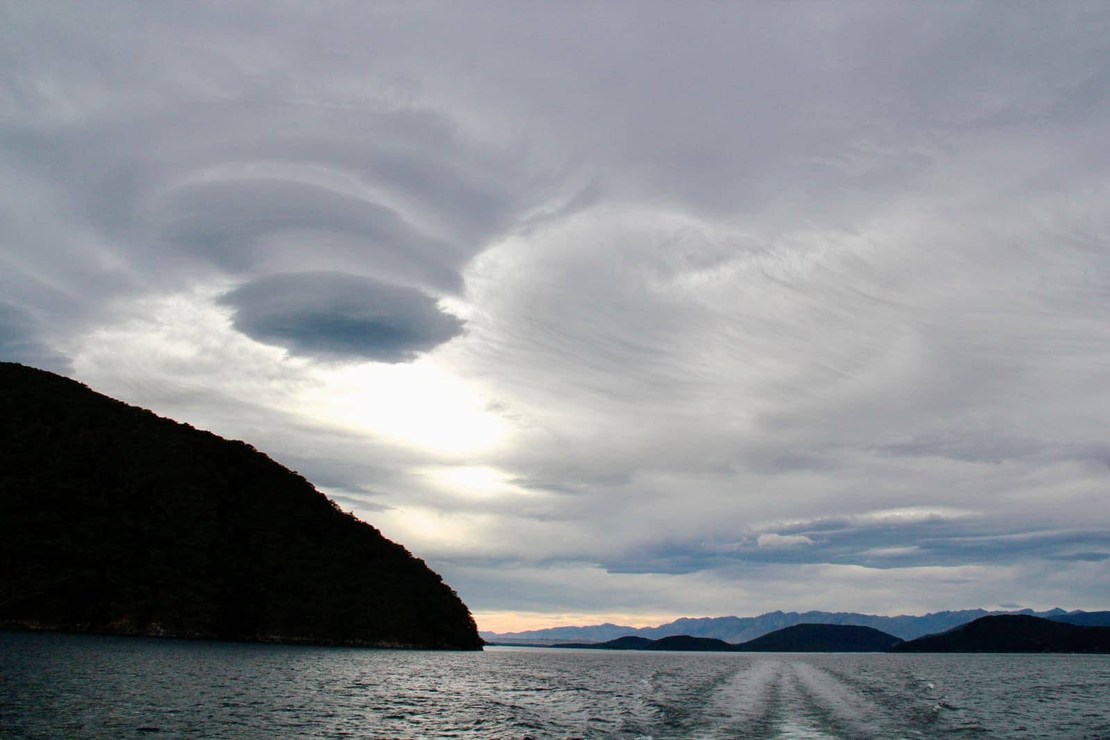 Swirled cloud formation over lake