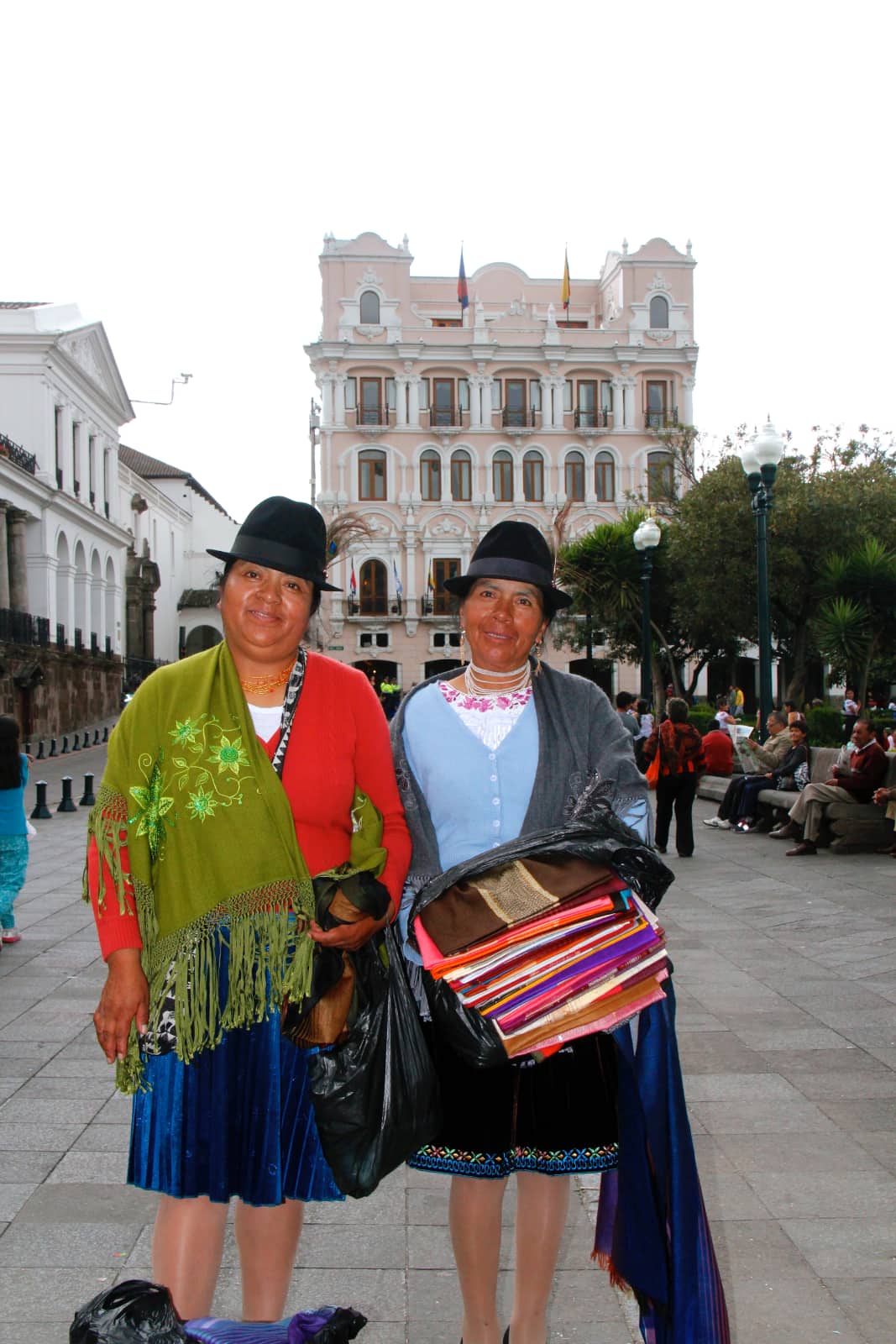 Two local women selling artisan items