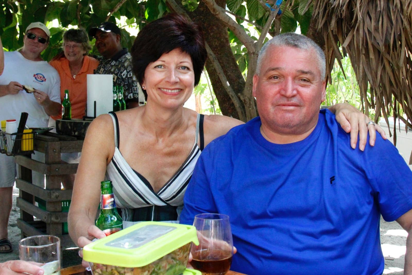 Woman and man posing for camera