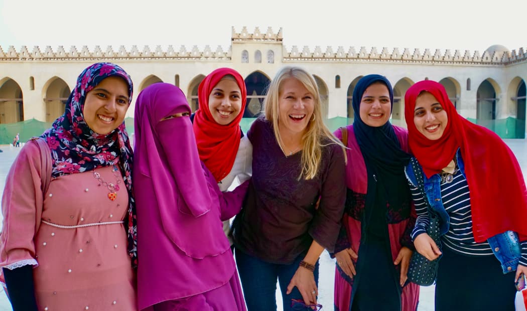 Women smiling and posing in Cairo