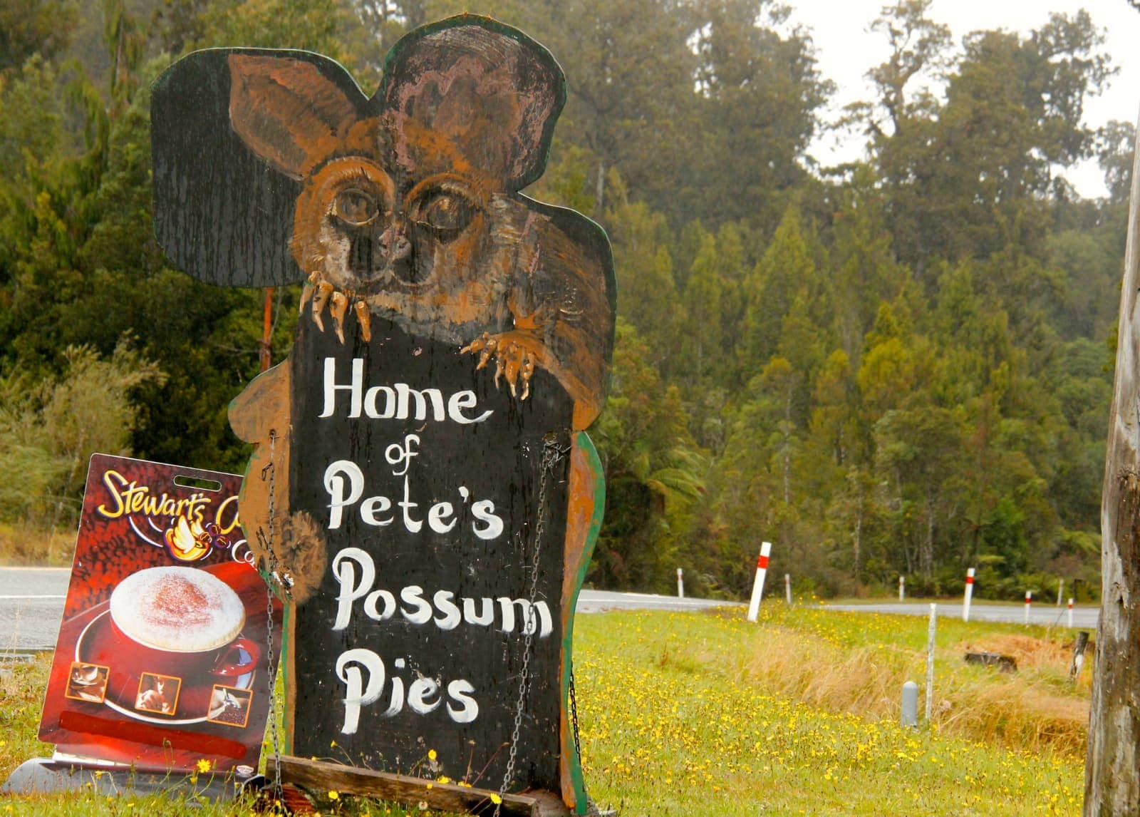 Wooden sign for local meat pie shop